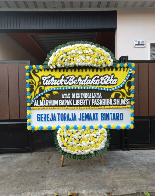 Papan Bunga Duka di Damang Batu
